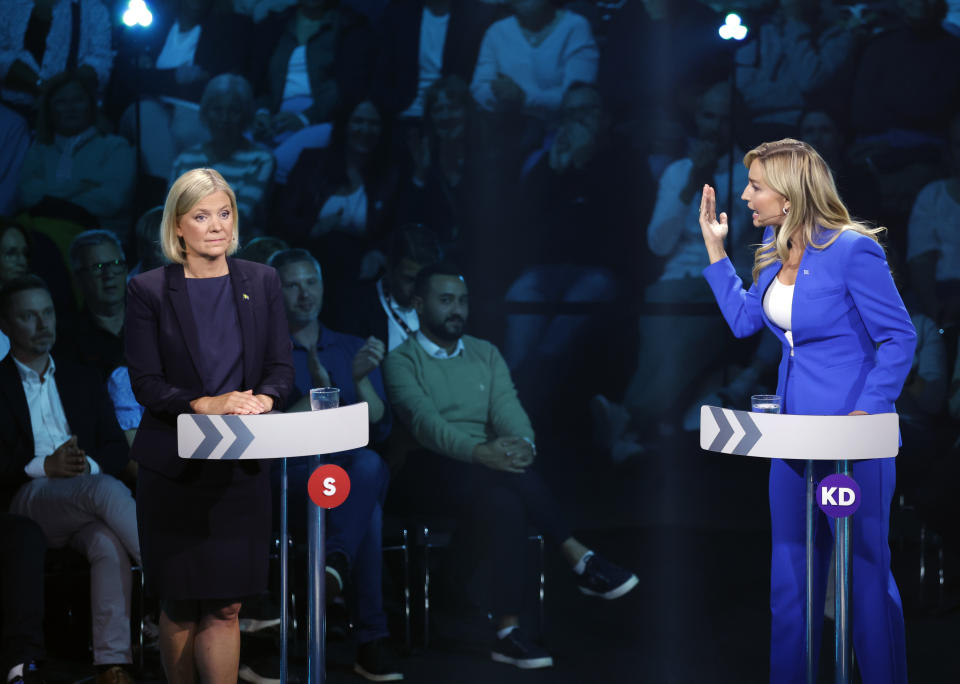 Prime minister Magdalena Andersson, leader of the Social Democrats, left, and Ebba Busch, leader of the Christian Democrats take part in a political debate broadcasted on TV4 from Eskilstuna, Sweden, Thursday Sept. 8, 2022. General elections will be held in Sweden on September 11. (Christine Olsson/TT via AP)