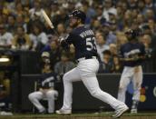 Oct 12, 2018; Milwaukee, WI, USA; Milwaukee Brewers relief pitcher Brandon Woodruff (53) hits a solo home run during the third inning against the Los Angeles Dodgers in game one of the 2018 NLCS playoff baseball series at Miller Park. Mandatory Credit: Jon Durr-USA TODAY Sports