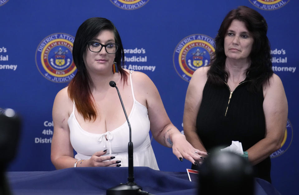 FILE - Ashtin Gamblin, left, who was shot during the massacre at Club Q in November 2022, responds to a question during a news conference after a hearing for the shooting suspect Monday, June 26, 2023, in Colorado Springs, Colo. Since 2016, thousands of Americans have been wounded in mass shootings, and tens of thousands by gun violence, and that number continues to grow, according to the Gun Violence Archive. (AP Photo/David Zalubowski, File)