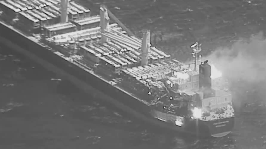 bulk carrier true confidence on fire after being hit by houthi anti ship ballistic missile