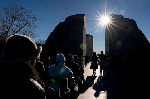 Martin Luther King III, right, the son of Martin Luther King Jr., accompanied by his wife Arndrea Waters King, left, speaks during a wreath-laying ceremony at the Martin Luther King Jr. Memorial on Martin Luther King Jr. Day in Washington, Jan. 16, 2023. (Andrew Harnik/AP)