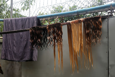 The hair processed for export are seen at Tet Nay Lin Trading Co. in Yangon, Myanmar, June 19, 2018. REUTERS/Ann Wang