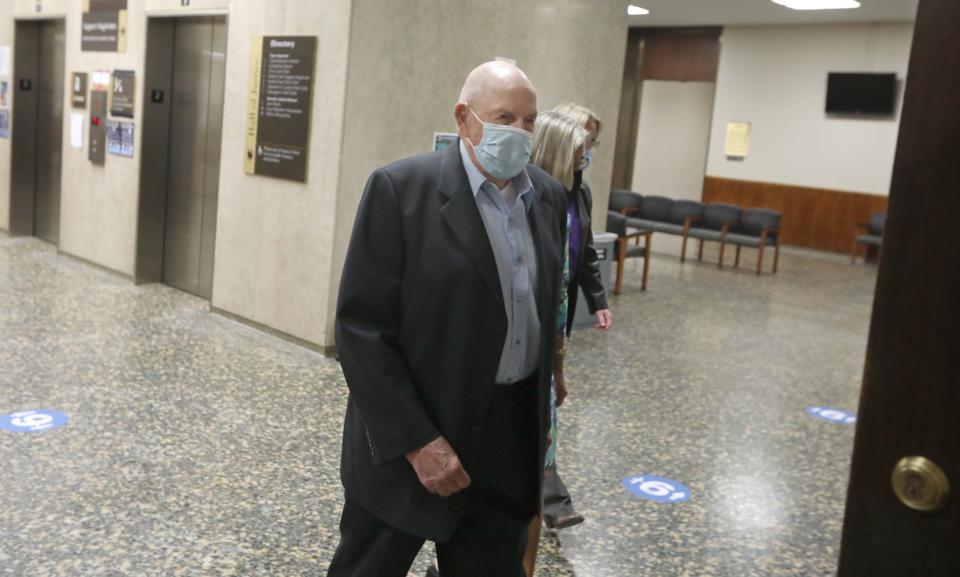 Robert Schlosser, father of Cathleen Krauseneck, heads back into court following a break during a hearing at the Hall of Justice in downtown Rochester Tuesday, June 22, 2021.