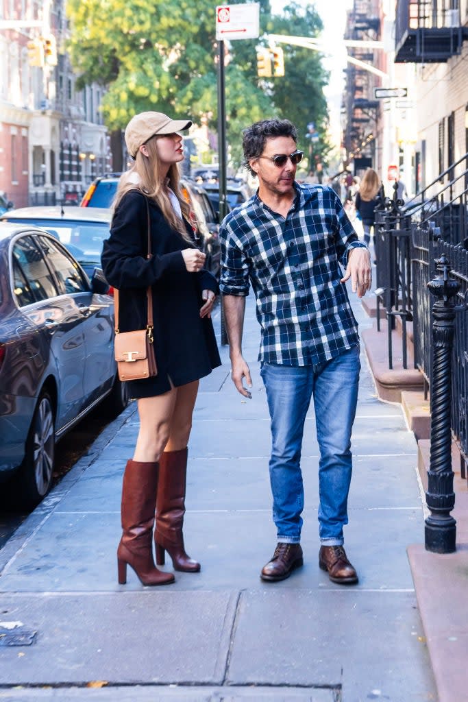 NEW YORK, NEW YORK - OCTOBER 26: Taylor Swift (L) and Shawn Levy are seen in the West Village on October 26, 2023 in New York City.