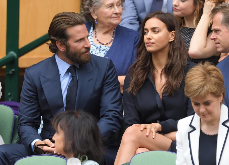 Bradley Cooper and Irina Shayk attend the Men's Final of the Wimbledon Tennis Championships between Milos Raonic and Andy Murray at Wimbledon on July 10, 2016.