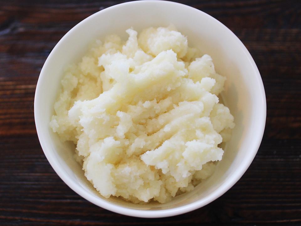big y mashed potatoes in a white bowl