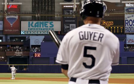 Tampa Bay Rays left fielder Brandon Guyer (5) on deck to bat as the MLB timing clock counts down between innings against the Toronto Blue Jays at Tropicana Field in St. Petersburg, Florida in this April 24, 2015, file photo. Mandatory Credit: Kim Klement-USA TODAY Sports