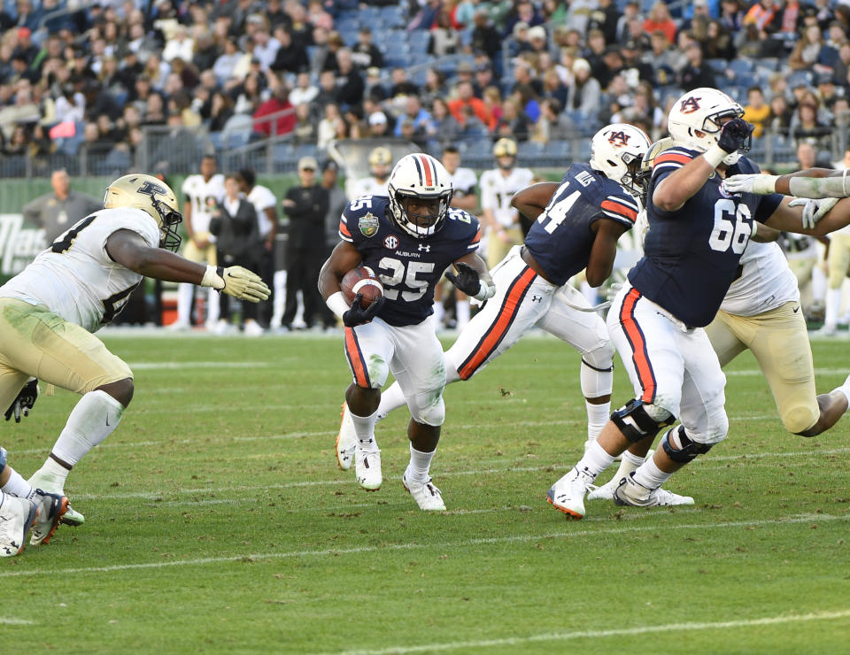 NASHVILLE, TN - DECEMBER 28: Auburn Tigers running back Shaun Shivers (25) runs the ball during the Music City Bowl game between the Purdue Boilermakers and the Auburn Tigers at Nissan Stadium on December 28, 2018 in Nashville, TN.  (Photo by Steve  Roberts/Icon Sportswire via Getty Images)