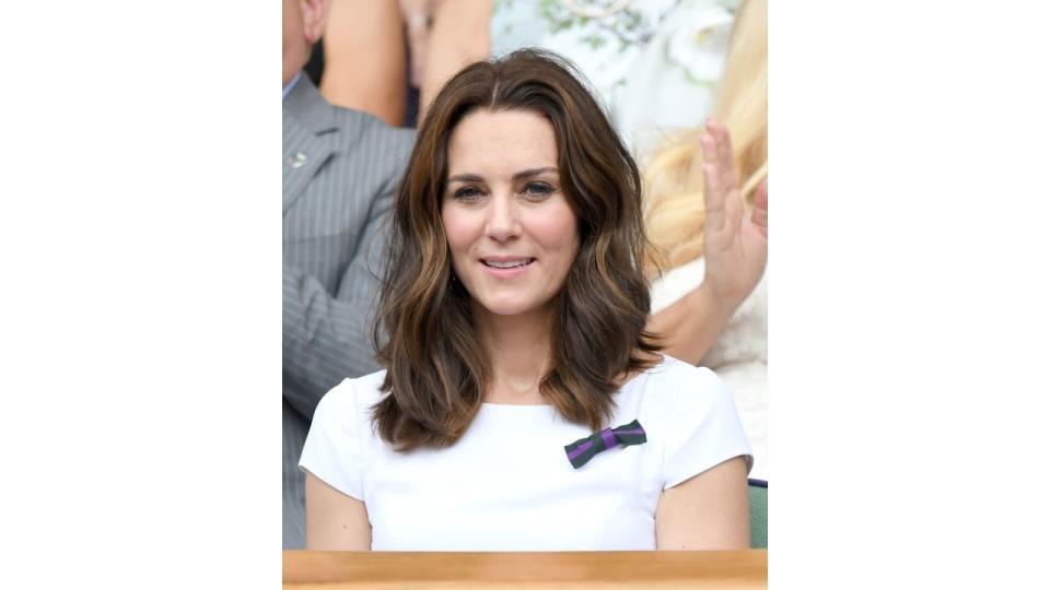 Kate Middleton at Wimbledon in 2017 wearing a white dress and sporting shorter hair