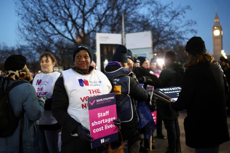 Nurses strike outside St Thomas' Hospital in London
