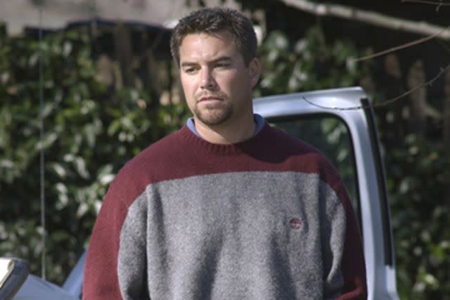 <p>Debbie Noda/Modesto Bee/Tribune News Service via Getty Images</p> Scott Peterson talking to investigators, February 18, 2003.