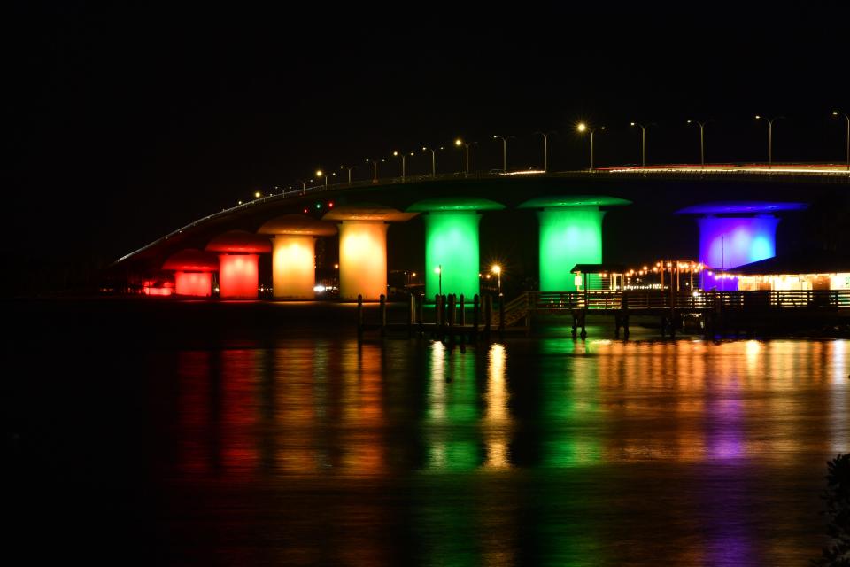 A file photo of the Ringling Bridge in Sarasota lit in rainbow colors to celebrate Pride Month.