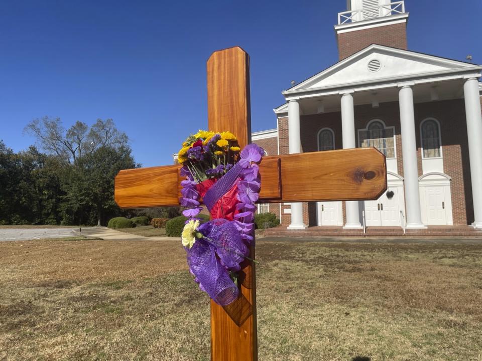 Flowers sit in a memorial to Bubba Copeland outside First Baptist Church in Phenix City, Ala., on Nov. 5, 2023. Copeland, the pastor of the church and the mayor of Smiths Station died by suicide. (AP Photo/Kim Chandler)