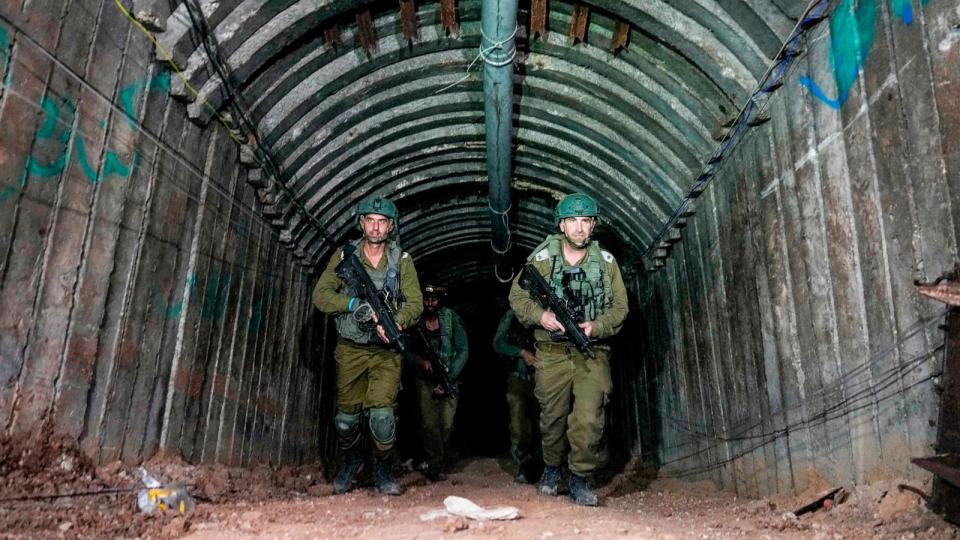 PHOTO: sraeli soldiers are seen in a tunnel that the military says Hamas militants used to attack the Erez crossing in the northern Gaza Strip, Dec. 15, 2023. (Ariel Schalit/AP)