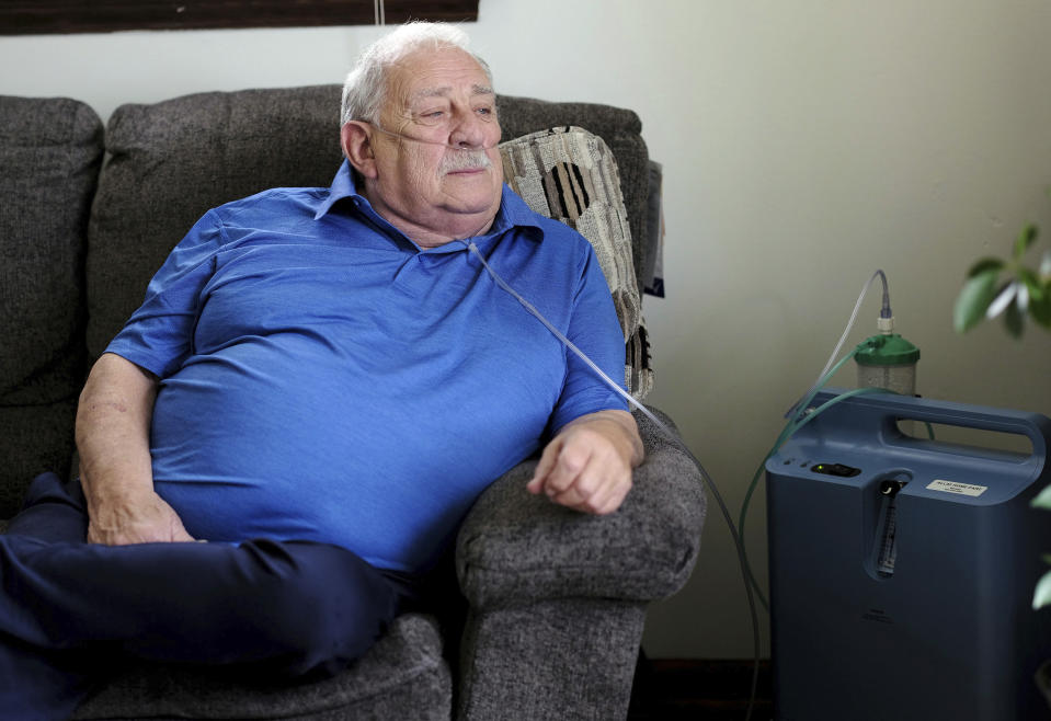 Retired coal miner James Bounds, who has pneumoconiosis, more commonly known as “black lung," poses for a photo at his home in Oak Hill, W.Va., Thursday, July, 13, 2023. Bounds said nothing can be done to reverse the debilitating illness he was diagnosed with at 37 in 1984. But he doesn't want others to suffer the same fate. (AP Photo/Chris Jackson)