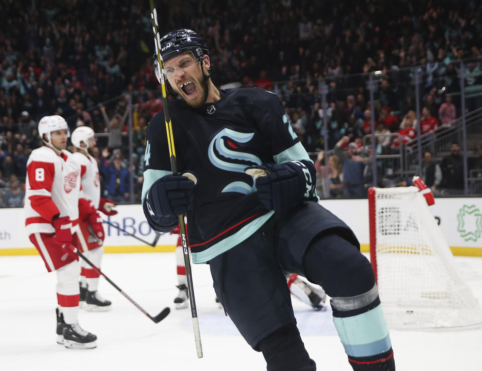 Seattle Kraken defenseman Jamie Oleksiak (24) reacts after scoring a goal against the Detroit Red Wings during the second period of an NHL hockey game Saturday, Feb. 18, 2023, in Seattle. (AP Photo/ Lindsey Wasson)