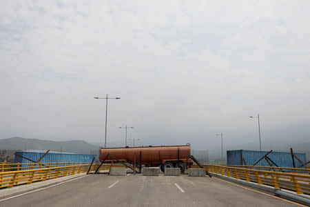 A fuel tank blocks the vehicular passage on Tienditas cross-border bridge between Colombia and Venezuela, in Cucuta, Colombia, February 6, 2019. REUTERS/Luisa Gonzalez