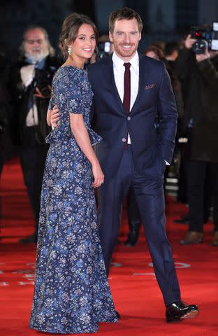 <p>Karwai Tang/WireImage</p> Alicia Vikander and Michael Fassbender arrive for the U.K. premiere of 'The Light Between Oceans' in October 2016 in London, England.