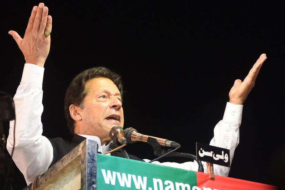 Former Pakistan prime minister Imran Khan addresses Pakistan Tehreek-e-Insaf (PTI) party supporters during a rally in Lahore on April 21, 2022.<span class="copyright">Arif ALI/ AFP via Getty Images</span>