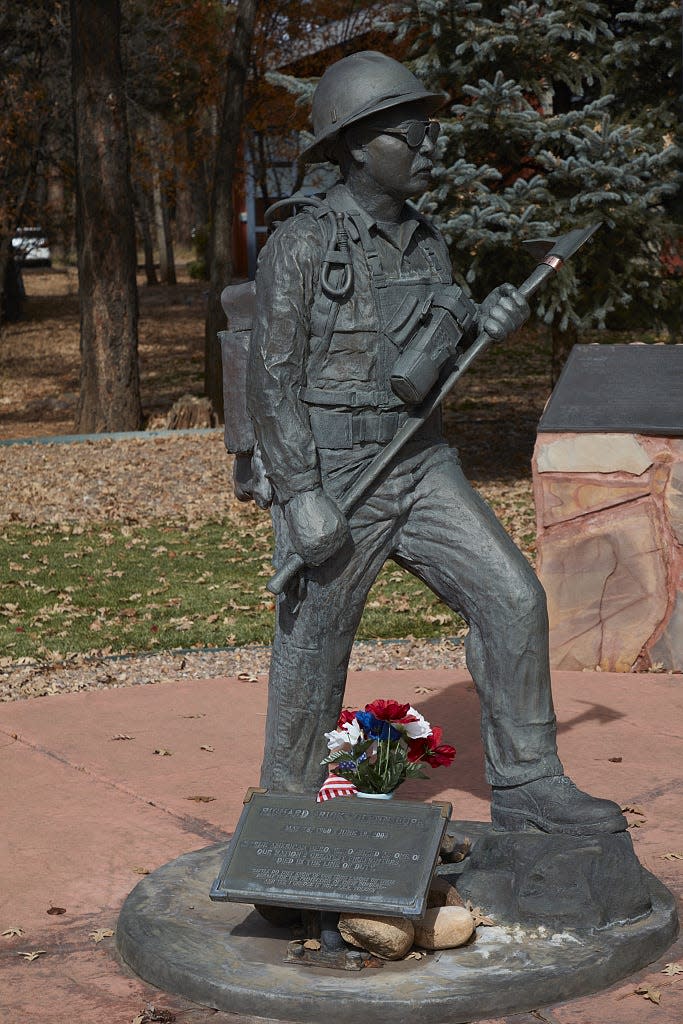 A memorial to firefighter Richard “Rick” Glenn Lupe stands in the town of Pinetop-Lakeside. Lupe is remembered as the man who helped stop the Rodeo-Chediski Fire from destroying Show Low and Pinetop-Lakeside.