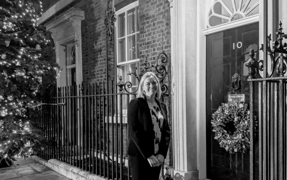 Kate Josephs marked her final day in Government by posing for a photograph outside the front door of Number 10