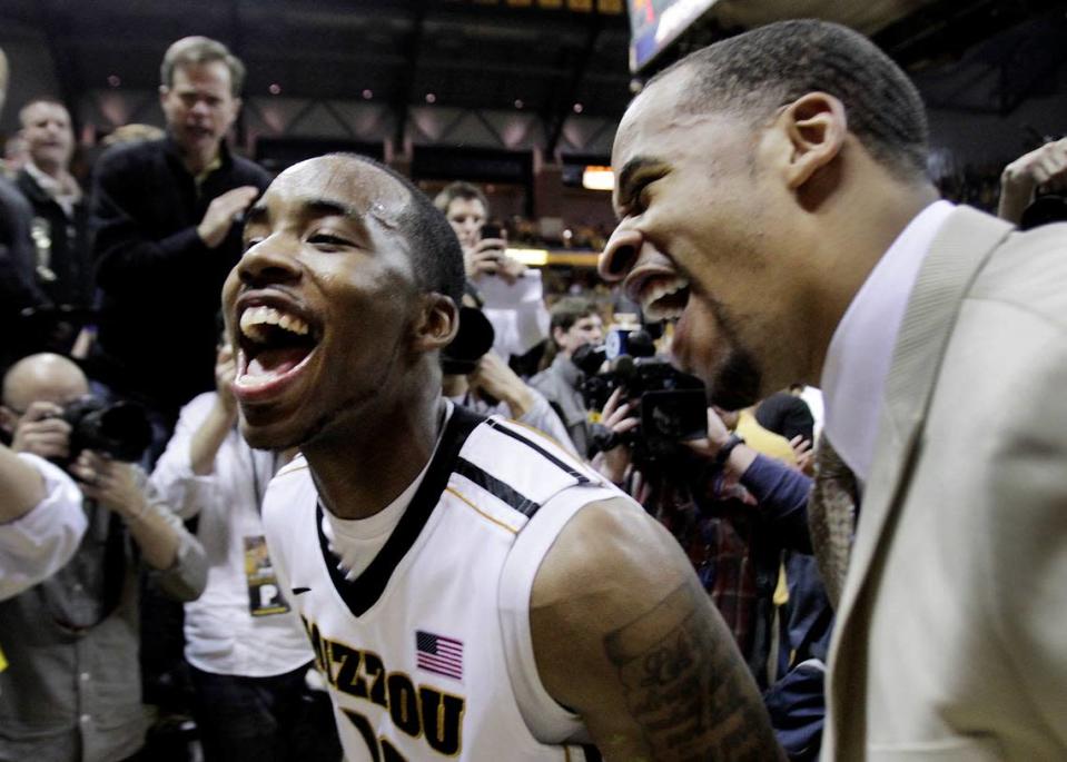 MU&#x002019;s Marcus Denmon got to celebrate with teammate Laurence Bowers after he scored 29 points to lead the Tigers to a 74-71 win over Kansas Saturday night at Mizzou Arena. RICH SUGG/The Kansas City Star_02042012