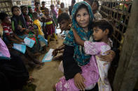 <p>Patients wait for medical treatment in the urgent out patient waiting area at the ‘Doctors Without Borders’ Kutupalong clinic on October 4, 2017, in Cox’s Bazar, Bangladesh. (Photograph by Paula Bronstein/Getty Images) </p>