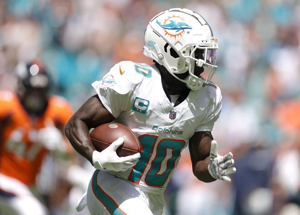 Tyreek Hill scored a 54-yard touchdown on Miami's opening drive Sunday. (Carmen Mandato/Getty Images)