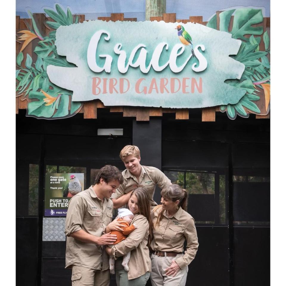 Irwin family in front of Grace's Bird Garden at Australia Zoo.