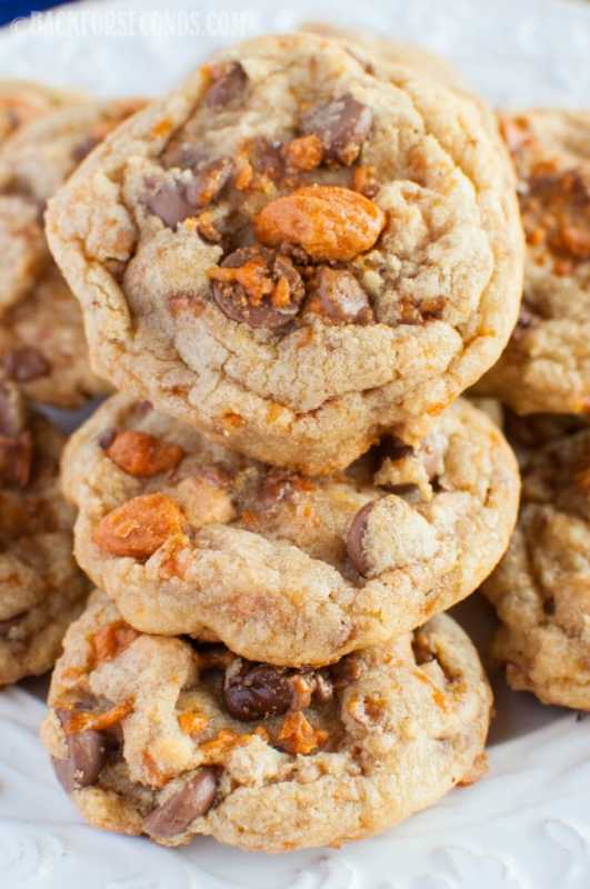 <p>Back for Seconds</p><p>These Brown Butter Butterfinger Cookies are every bit as good as they sound! Chewy, buttery cookies with chocolate, peanut butter chips and Butterfingers! </p><p><strong>Get the recipe: <a href="https://backforseconds.com/brown-butter-butterfinger-cookies/" rel="nofollow noopener" target="_blank" data-ylk="slk:Brown Butter Butterfinger Cookies;elm:context_link;itc:0;sec:content-canvas" class="link rapid-noclick-resp">Brown Butter Butterfinger Cookies</a></strong></p>
