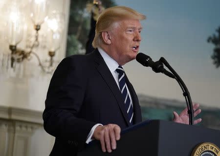 FILE PHOTO - U.S. President Donald Trump makes a statement on the mass shooting in Las Vegas from the Diplomatic Room at the White House in Washington, U.S., October 2, 2017. REUTERS/Joshua Roberts