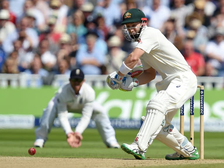 Australia's Peter Nevill (R) plays a shot on the third day of the third Ashes cricket test match between England and Australia at Edgbaston in Birmingham, central England, on July 31, 2015