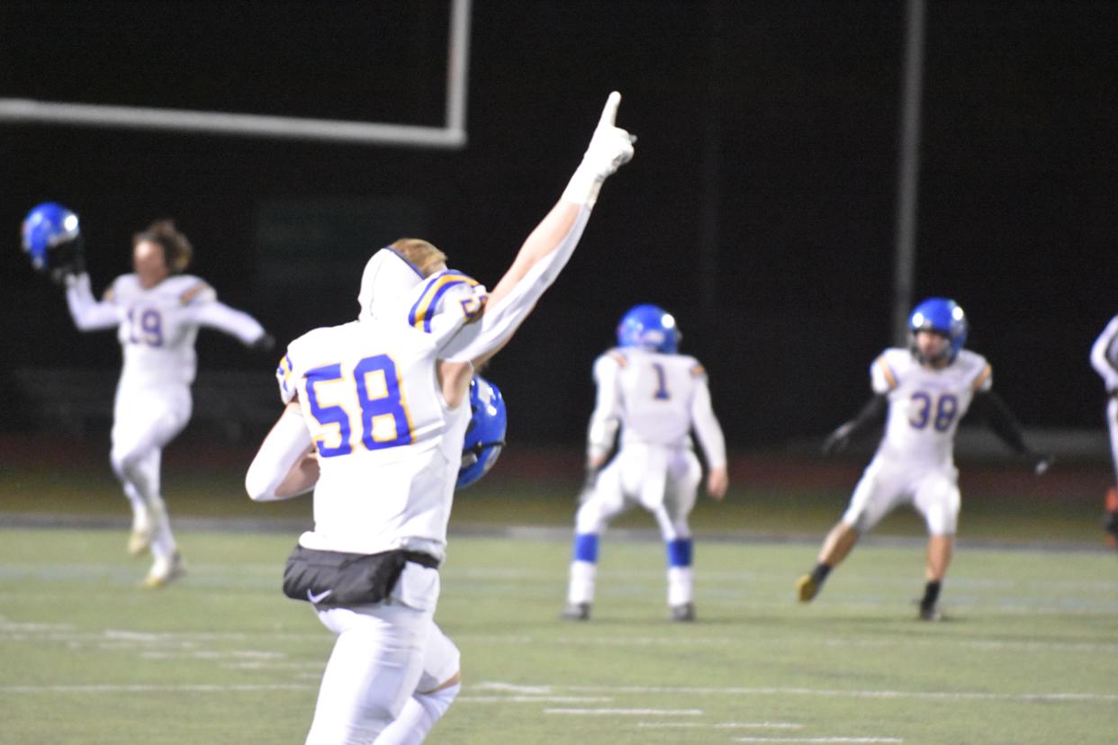 Junior Blake Chaffee runs on the field after the Serrano football team defeats the Buena football team, 21-14.