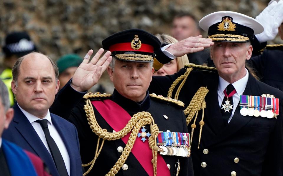 Ben Wallace, the Defence Secretary, and General Sir Nick Carter, the former Chief of the Defence Staff, at the fuberal of Maj Gen Holmes - Andrew Matthews/PA