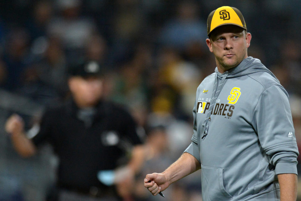 Sep 20, 2019; San Diego, CA, USA; San Diego Padres manager Andy Green (14) walks back to the dugout during the eighth inning against the Arizona Diamondbacks at Petco Park. Mandatory Credit: Jake Roth-USA TODAY Sports