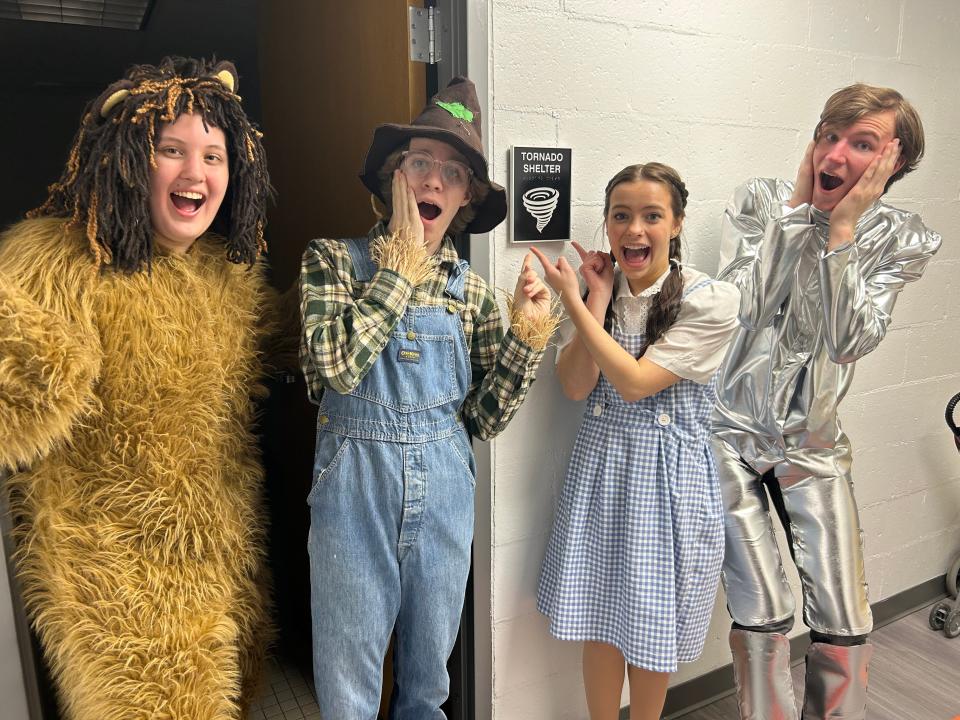 Abigail Prucha, Garin Gingerich, Sydney Purcell, and Derek Shimek, from left, spot a tornado. The four will headline a production of "The Wizard of Oz," March 21-23, at New Philadelphia High School.