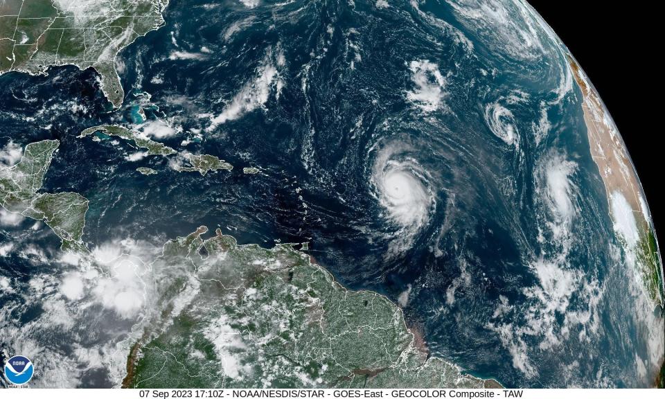 A satellite image taken Thursday afternoon, September 7, 2023, shows Hurricane Lee (center) spinning in the open Atlantic Ocean.