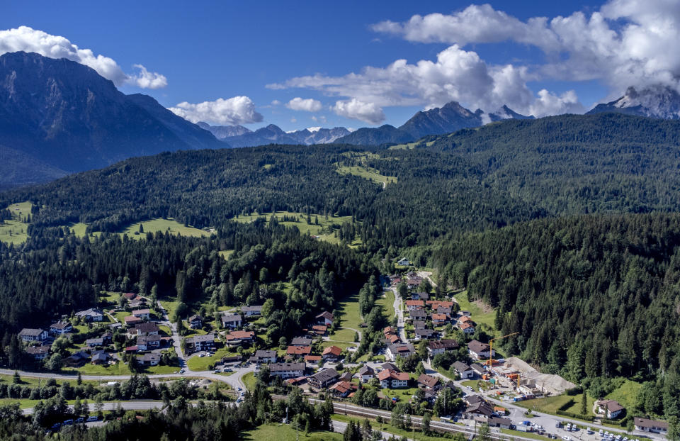 The village of Klais, Germany from where the road goes up to Elmau Castle is pictured Saturday, June 25, 2022. The G7 summit will start on Sunday. (AP Photo/Michael Probst)