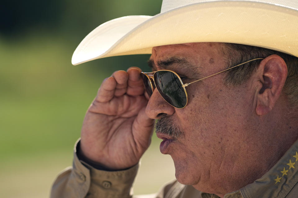 Maverick County Sheriff Tom Schmerber talks about the immigration challenges facing his country, Thursday, Oct. 19, 2023, in Eagle Pass, Texas. Starting in March, Texas will give police even broader power to arrest migrants while also allowing local judges to order them out of the U.S. under a new law signed by Republican Gov. Greg Abbott. (AP Photo/Eric Gay)