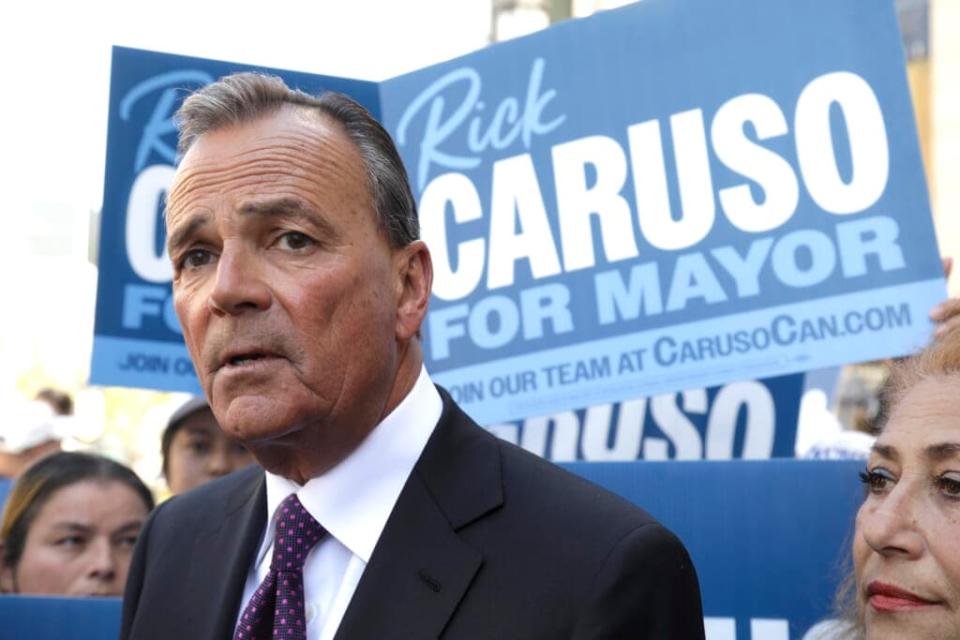 Businessman Rick Caruso talks to members of the media and supporters after Los Angeles City Councilman Joe Buscaino announced that hes dropping out of Los Angeles mayoral race and putting his support behind Caruso for mayor of Los Angeles at The Grove in Los Angeles on May 12, 2022. (Genaro Molina / Los Angeles Times via Getty Images)