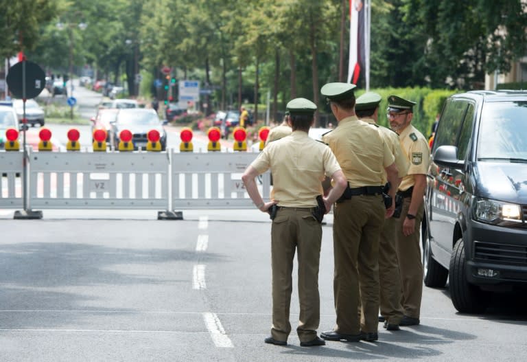 Police stand at a checkpoint at the venue of Germany's Bayreuth opera festival on July 25, 2016