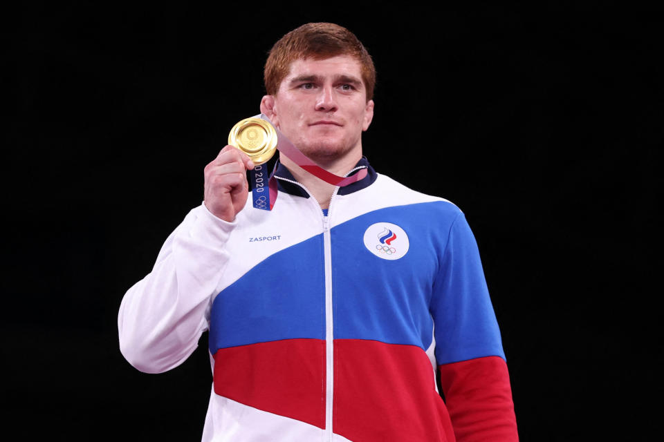 Image: Gold medalist Russia's Musa Evloev (Jack Guez / AFP - Getty Images)