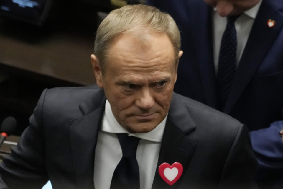 The leader of Poland's opposition alliance, Donald Tusk attends the first session of the lower house, or Sejm, of the newly-elected parliament in Warsaw, Poland, on Monday, Nov. 13, 2023 after an election last month heralded a change of course for the Central European nation at a time of war across the border in Ukraine. The coalition collectively won most seats in the parliament, but outgoing Prime Minister Mateusz Morawiecki will be given the first chance to try to form a new government because his party is the biggest single bloc in the Sejm now, although it lacks majority. (AP Photo/Czarek Sokolowski)