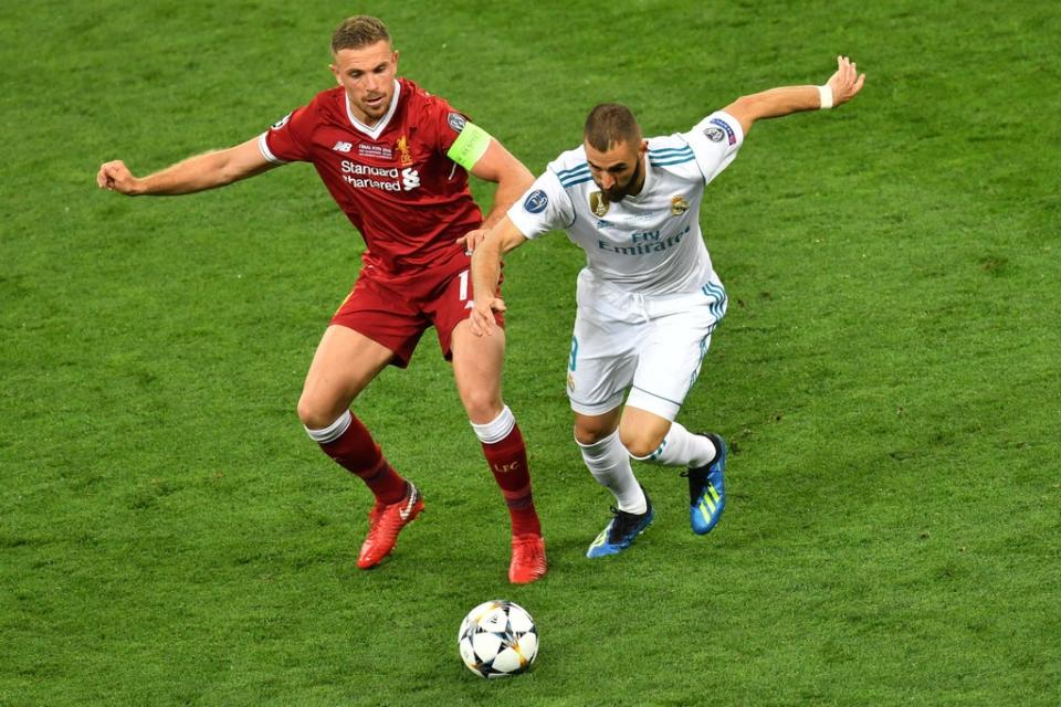 Jordan Henderson and Karim Benzema during the 2018 Champions League final (AFP via Getty Images)