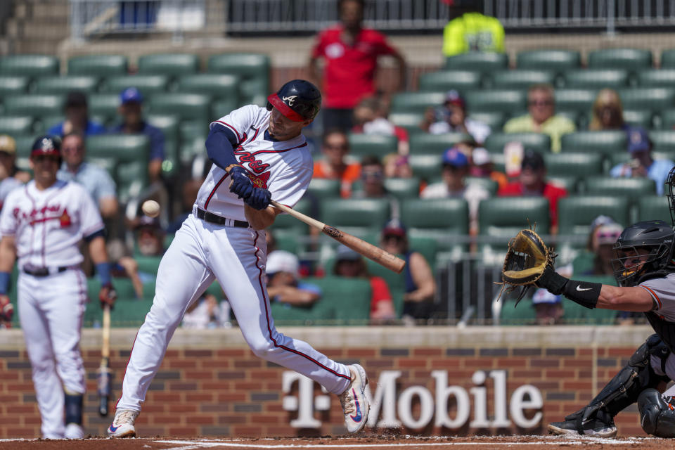 Atlanta Braves' Matt Olson (28) hits a home run in the first inning of a baseball game against the Baltimore Orioles on Sunday, May 7, 2023, in Atlanta. (AP Photo/Erik Rank)
