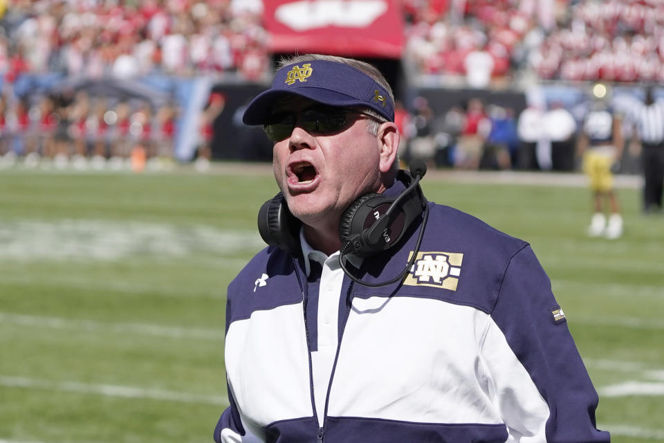 Notre Dame head coach Brian Kelly yells at an official during the first half of an NCAA college football game between Wisconsin and Notre Dame Saturday, Sept. 25, 2021, in Chicago. (AP Photo/Charles Rex Arbogast)