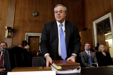 FILE PHOTO: Former energy lobbyist David Bernhardt arrives to testify before a Senate Energy and Natural Resources Committee hearing on his nomination of to be Interior secretary, on Capitol Hill in Washington, U.S., March 28, 2019. REUTERS/Yuri Gripas