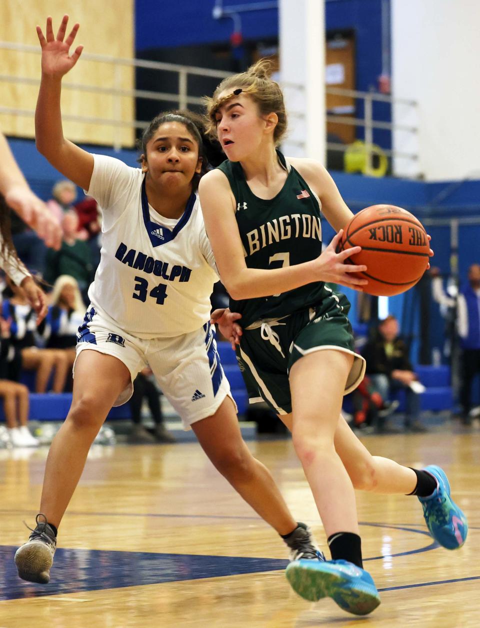 Abington's Ava Williamson dribbles around Randolph defender Jailiany Baez Batista during a game on Thursday, Dec. 22, 2022.