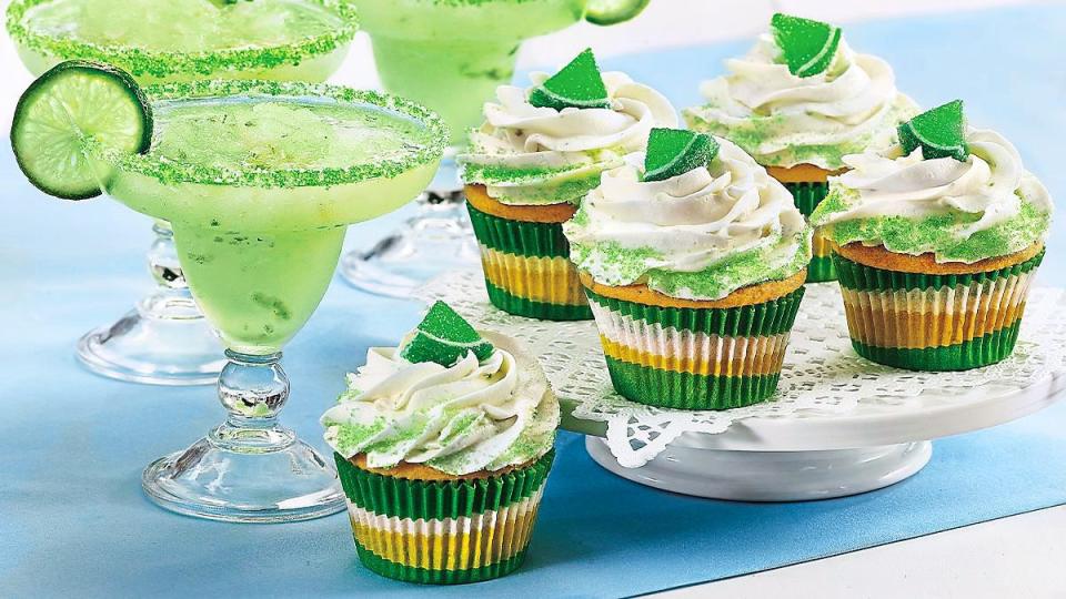 Key Lime Margarita Cupcakes sits next to a margarita (Cocktail cupcakes)