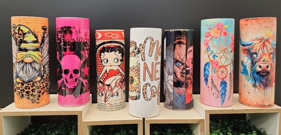 Tumblers On The Go, located in the Mall of Abilene, 4310 Buffalo Gap Road, held a grand opening Monday. The business offers specialty print tumblers, totes, apparel and more with services to custom design items.